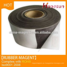 Anisotropic rubber magnet rolls with adhesive